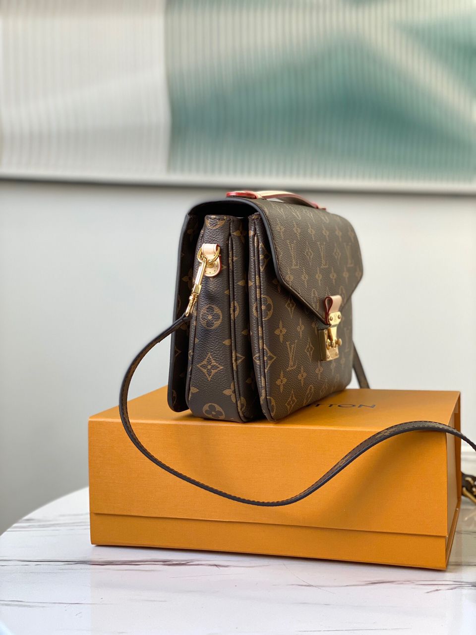 Louis Vuitton Pochette Métis vista frontal